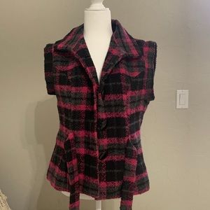 Black and pink vest.